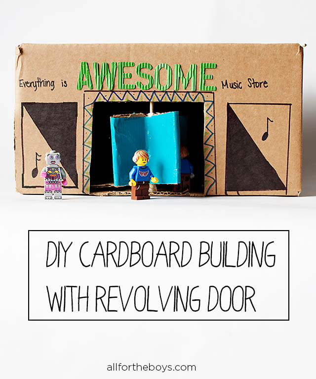 DIY cardboard building with revolving door - from All for the Boys blog