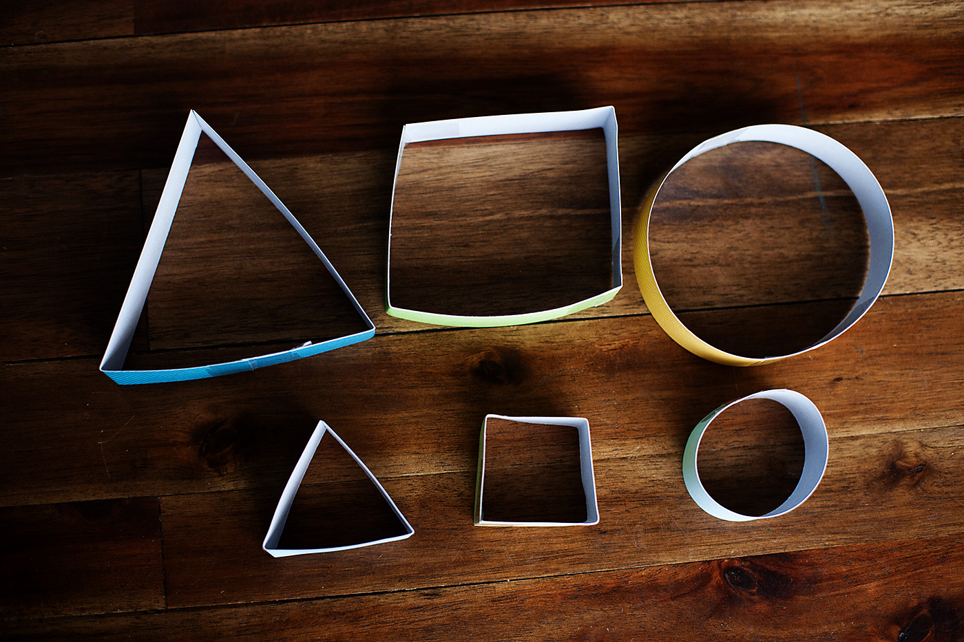 Straw planes made with different shapes. So easy to make out of a straw, paper and tape!