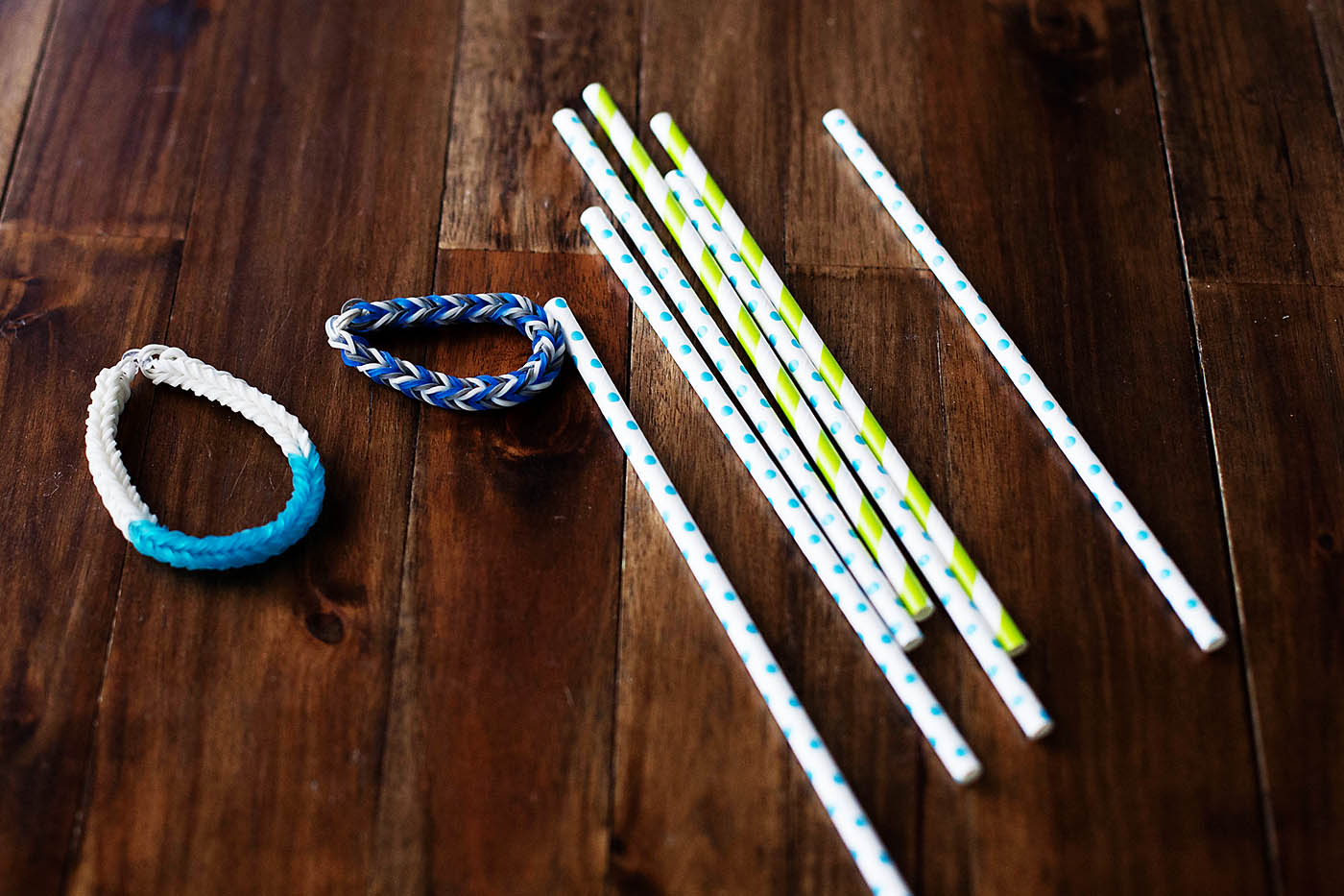 Paper plate targets and rubber band bracelet bow and arrow