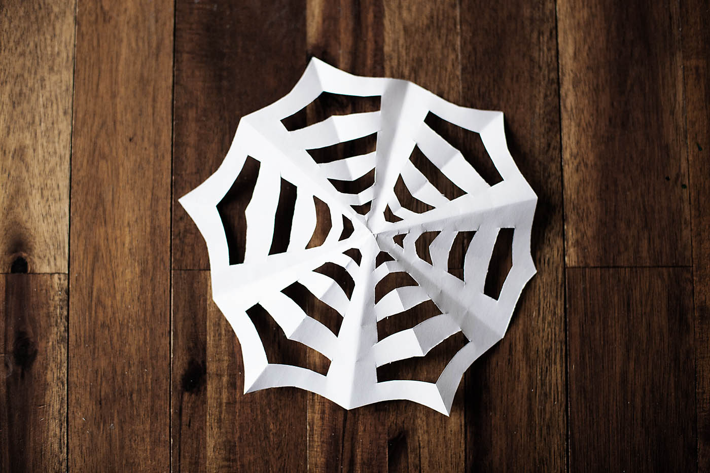 Paper spiderweb - like snowflakes, but for Halloween!