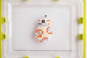 DIY BB8 perler bead cord keeper. Make your droid anyway you want! Such fun Star Wars craft. We love BB-8!