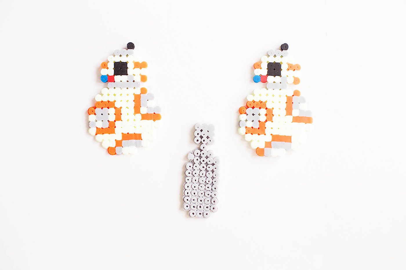 DIY BB8 perler bead cord keeper. Make your droid anyway you want! Such fun Star Wars craft. We love BB-8!