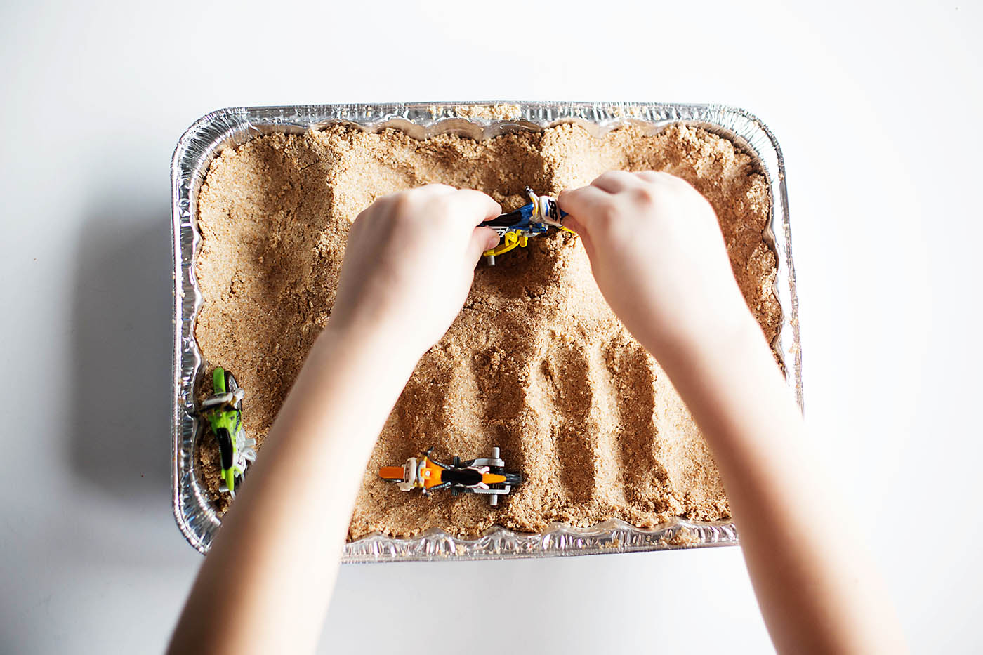 DIY sand for a toy motocross track - fun indoor play idea!