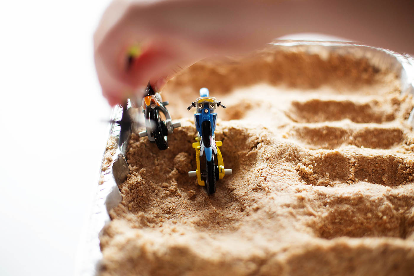 DIY sand for a toy motocross track - fun indoor play idea!