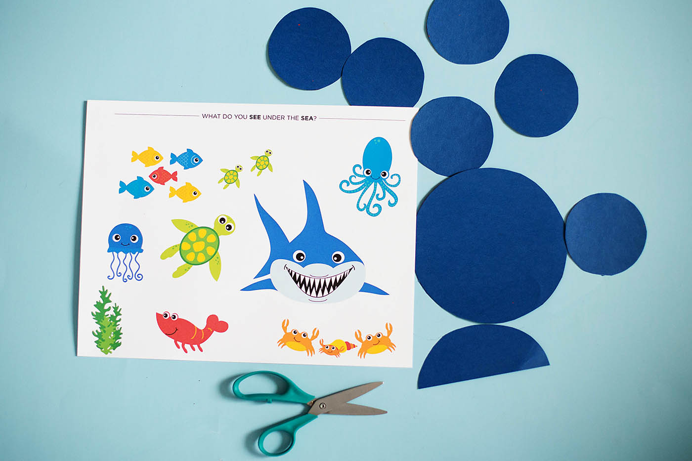 An ocean themed cutting craft perfect for kids learning to use scissors a 4 year-old milestone!