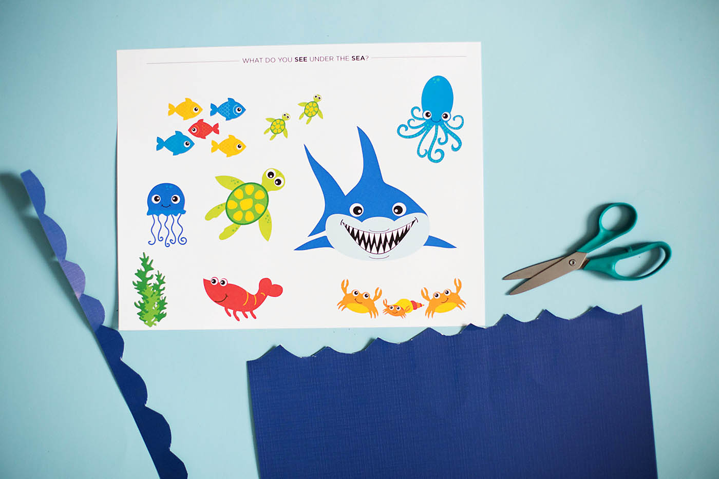 An ocean themed cutting craft perfect for kids learning to use scissors a 4 year-old milestone!